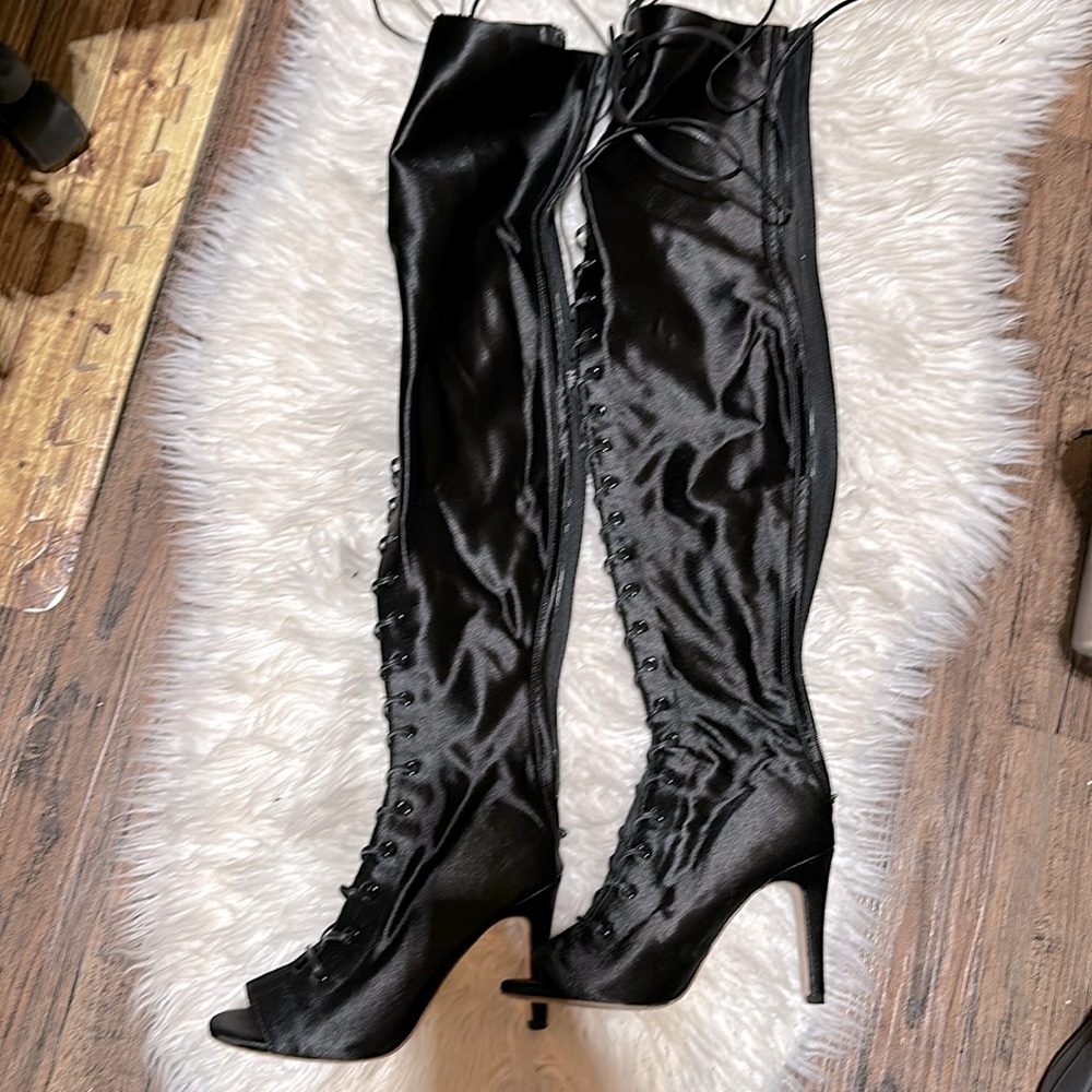 Black satin lace up side zip peep toe satin boots.  Size 8.